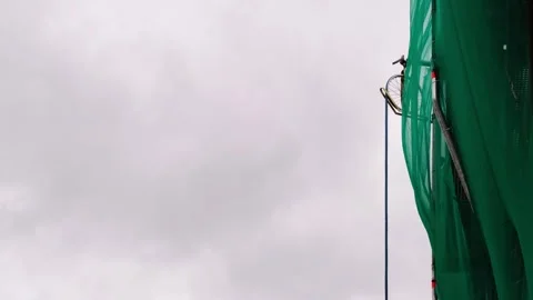 Clever old proven method, a wheel to pull up and let down tools and materials Stock Footage 270371315