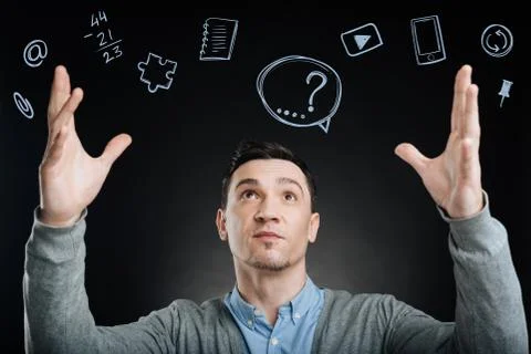 Clever web developer putting his hands up and looking confident Stock Photos