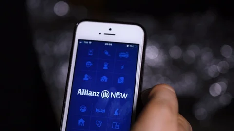 Click on the Allianz application icon on your smartphone Stock Footage 128196076