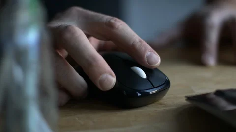 Click! A black computer mouse on a work desk. Stock Footage 127394702