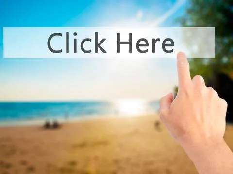 Click Here - Hand pressing a button on blurred background concept on visual s Stock Photos