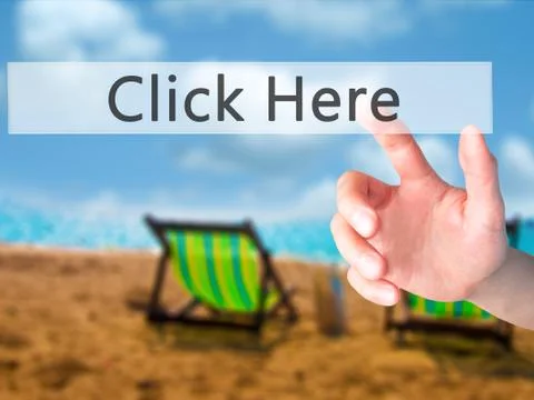 Click Here - Hand pressing a button on blurred background concept on visual s Stock Photos