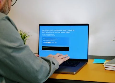 ClickFix BSOD Cyber Attack - Hackers Exploit Users Stock Photos