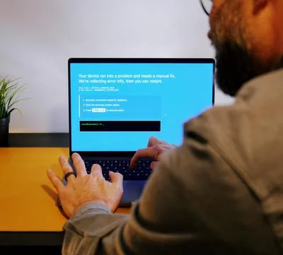 ClickFix BSOD Cyber Attack - Hackers Exploit Users Stock Photos