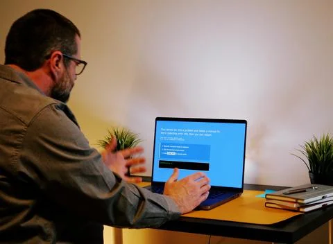 ClickFix BSOD Cyber Attack - Hackers Exploit Users Foto stock