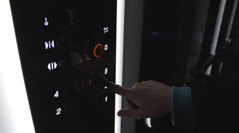 Clicking on the button in an elevator and lift movement Stock Footage 47636685