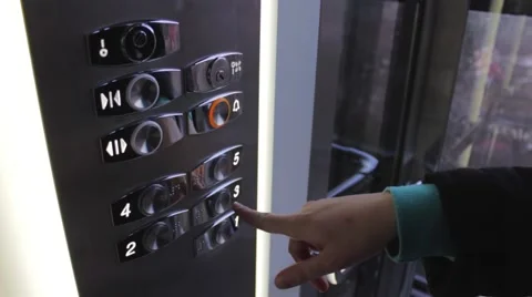 Clicking on the button in an elevator and lift movement Stock Footage 47636717