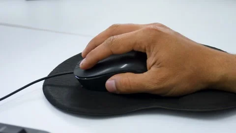 Clicking a Computer Mouse, Hand Using a Mouse on Desk, User Clicking with Stock Footage 312004029