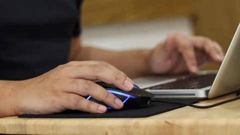 Clicking digital mouse. Hacker Breaks into System business technology. 4K Stock Footage 122195702