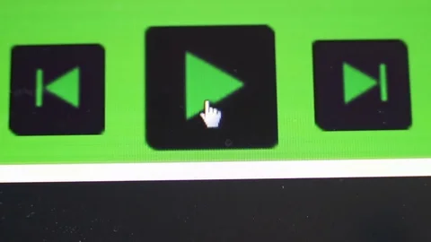 Clicking play button on computer screen Stock Footage 73374376