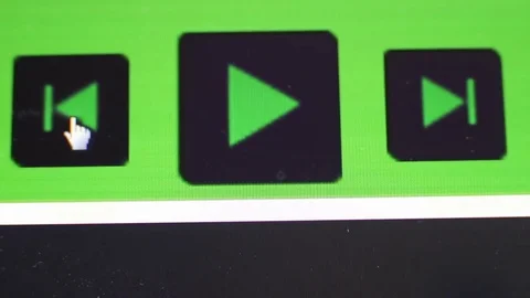Clicking play button on computer screen Stock Footage