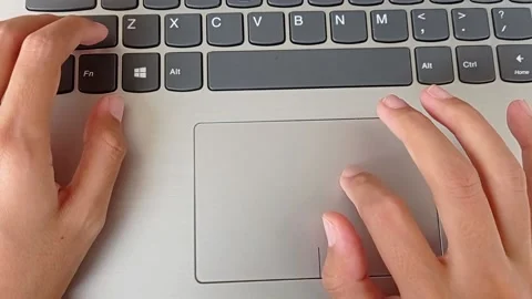 Clicking with the touchpad on the laptop Stock Footage 150398507
