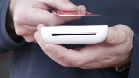 Client buying with card. Pos payment in shop or supermarket. Closeup of hand Video stock 148752926