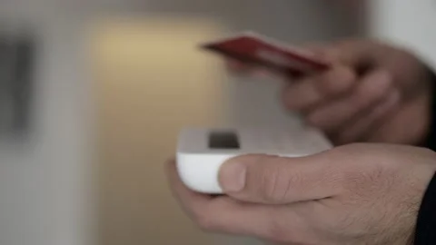 Client buying with Pos payment in shop or supermarket. Contactless card Video stock 148753768