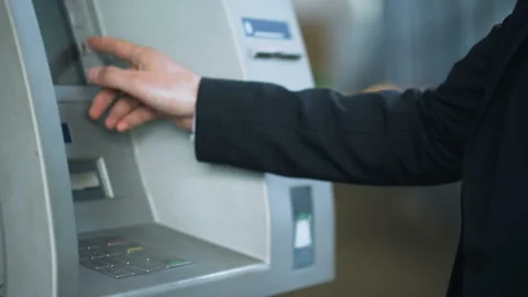 Client entering pin code on ATM and receiving Russian rubles, banking services Stock Footage 90913896