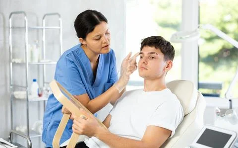 Client gazed into mirror Stock Photos