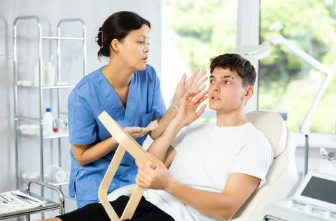 Client gazed into mirror Stock Photos