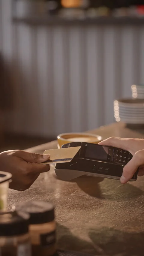 Client Paying with Contactless Credit Card on Pos Terminal in Cafe Stock Footage 344371810