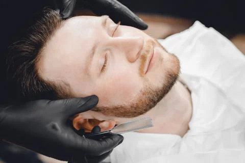 Client is preparing for royal shaving razor barbershop Stock Photos