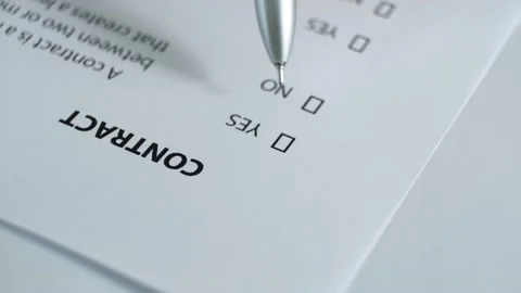 The client reads the paper document "Contract". Stock Footage 157532885