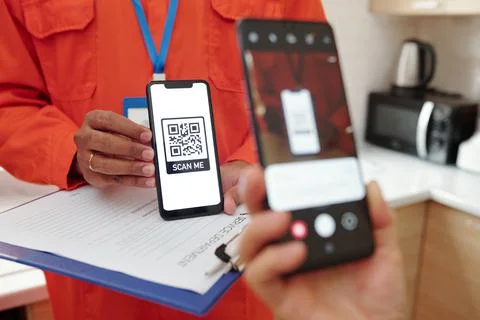 Client scanning QR code for payment Stock Photos