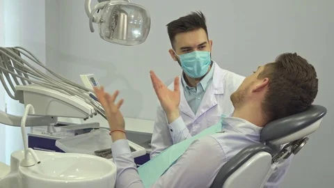 Client shows thumb up at the dentist's office Stock Footage 76522227