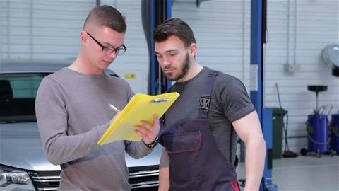 Client signs a list of repairs Stock Footage 251113829