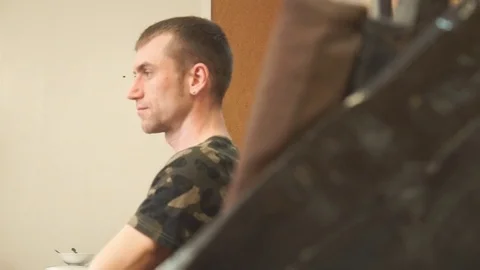 The Client in a Tattoo Parlor Waiting Stock Footage 74713188