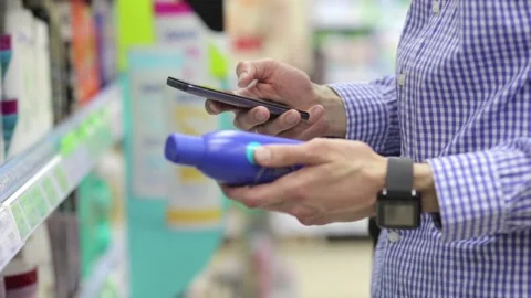 The client uses a smartphone and a card for payment. Stock Footage 152709669