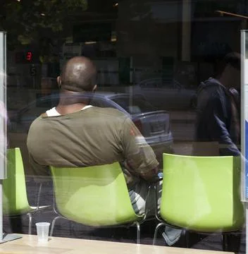 Client waiting in an electronic queue in the office Stock Photos