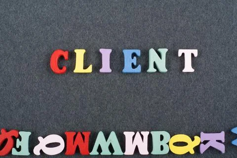 CLIENT word on black board background composed from colorful abc alphabet b.. 库存照片