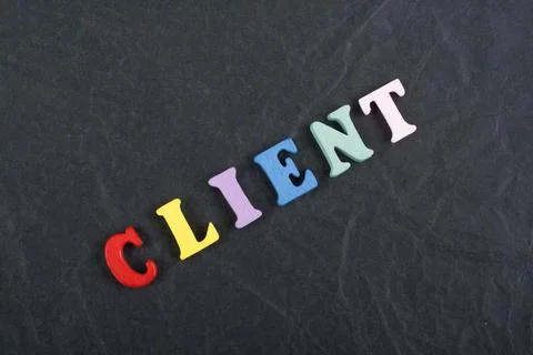 CLIENT word on black board background composed from colorful abc alphabet b.. Stock Photos