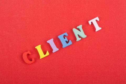 CLIENT word on red background composed from colorful abc alphabet block woo.. Stock Photos