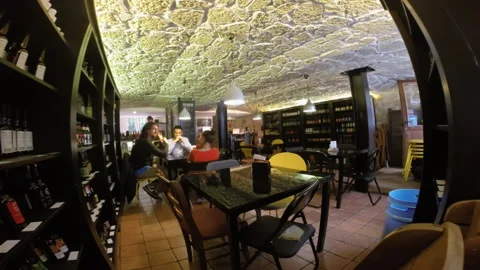 Clients Chatting Inside Stone Vaulted Beer Bar and Bottle Shop Vídeo Stock 344957275