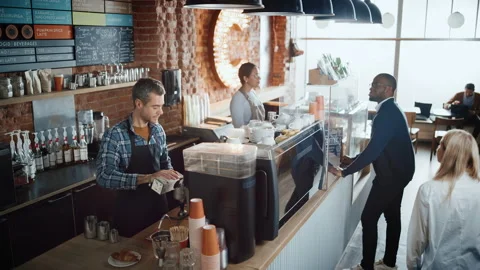 Clients Ordering Coffee in Cafe Stock Footage 143717336