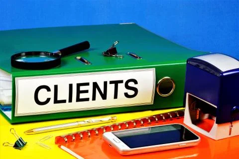 Clients-text label on the Registrar's folder. Planning brand promotion, Stock Photos