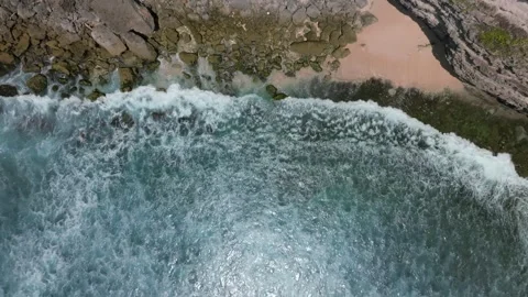 Cliff aerial top down view of a rocky coastline in Uluwatu, Bali. Stock Footage 253422328
