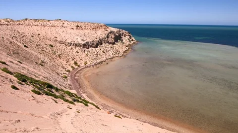 Cliff and beach with ocean Stock Footage 90063742