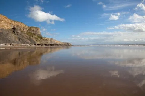 Cliff and beach Stock Photos