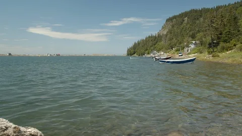 Cliff and sea side small fishing village, 4k Stock Footage 112764326
