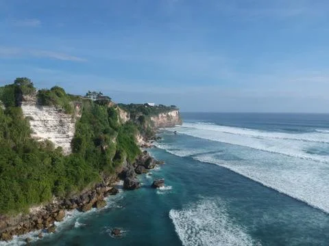 Cliff and waves in Bali Stock Photos