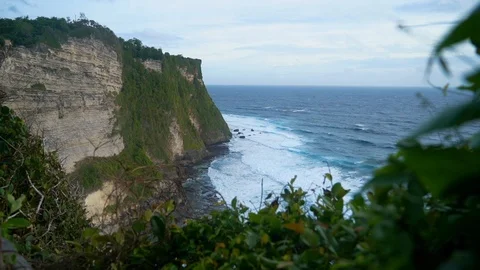 Cliff And The Waves Of Indian Ocean In Bali View From Uluwatu Temple Stock Footage 104536787