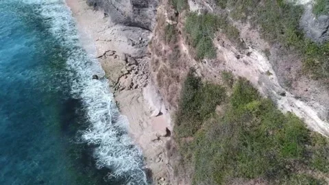 Cliff base by the beach 2 Stock Footage 266405111