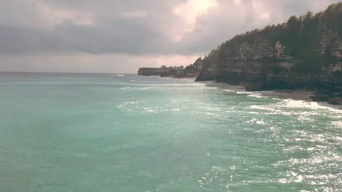Cliff at a beach aerial Stock Footage 278768827