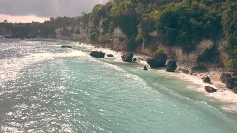 Cliff at the beach aerial Stock Footage 278769146