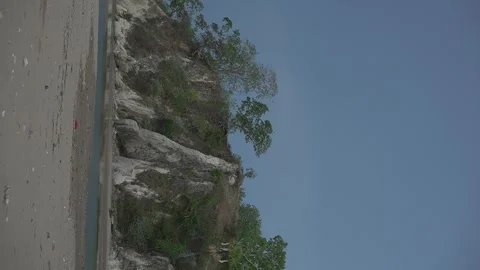 A cliff on the beach, vertical Stock Footage 291106786