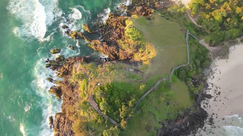 CLIFF, BEACH, WAVES AND ROCKS SEEN FROM ABOVE 스톡 동영상 326015841