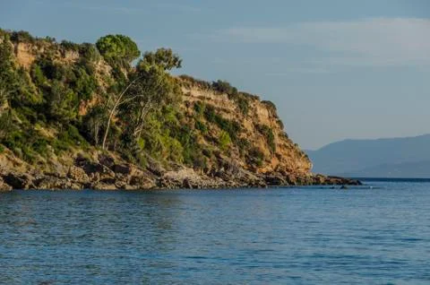 Cliff breaking mountains sea ionic on the beach of lourdata kefalonia Stock Photos