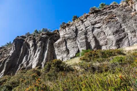 Cliff climbing Stock Photos