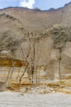 Cliff destroyed by the storm Stock Photos